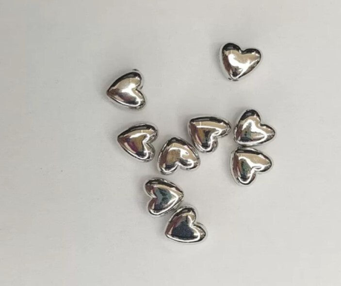 100 Corazon plateado acrilico 9*8mm