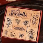 Caja sellos flores en base de madera