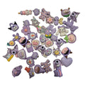 CHARMS PACKS LILAS 44 UNIDADES