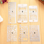 Reglas de acero con diseños para agendas