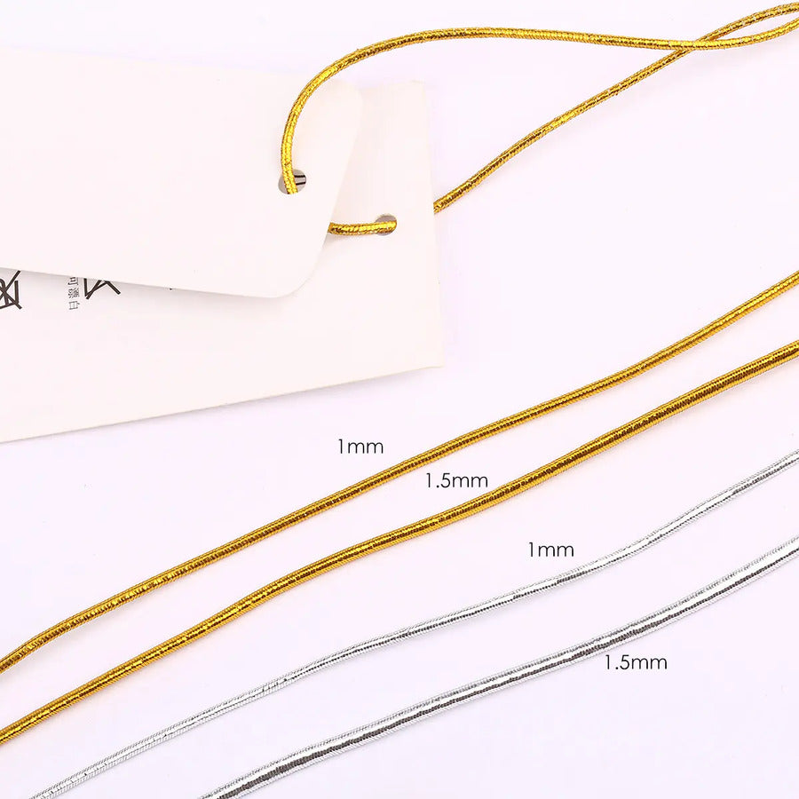 10m Elastico brilloso dorado o plateado 1mm