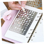 Reglas de acero con diseños para agendas