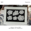 FLORES EN PAPEL VEGETAL CON RELIEVE EN BLANCO
