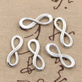 10 Dije Infinito 23x8mm