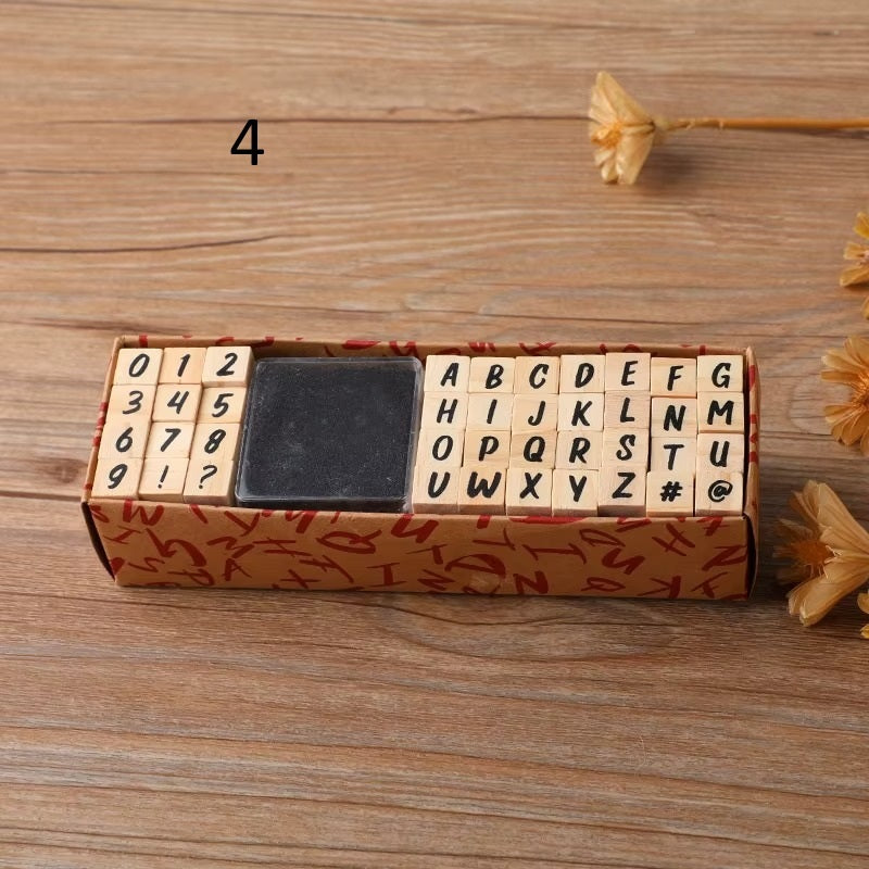Caja sellos alfabetos base madera