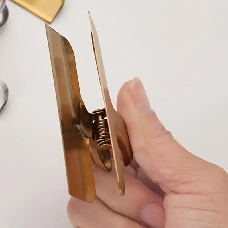 PINZA DORADA