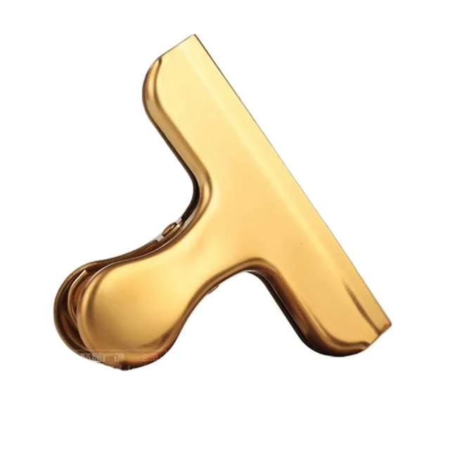 PINZA DORADA